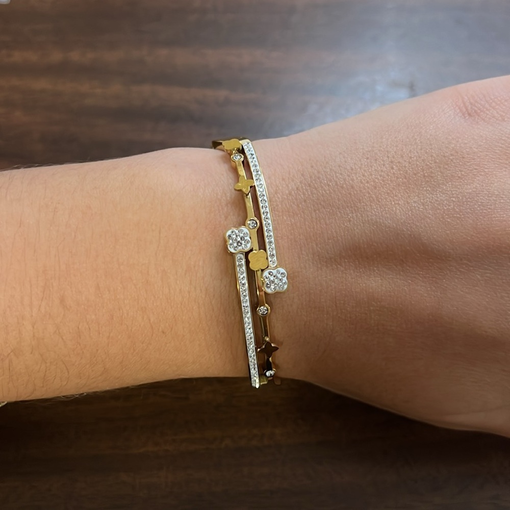 Gold plated stainless steel clover rhinestone bangle bracelet